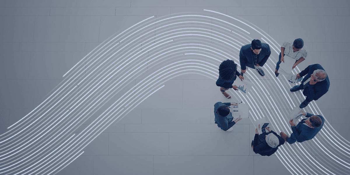 Overhead shot of people standing in a circle