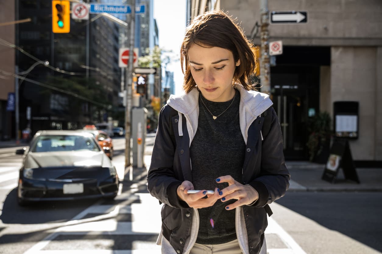 Woman checking her online bank in Toronto, Canada