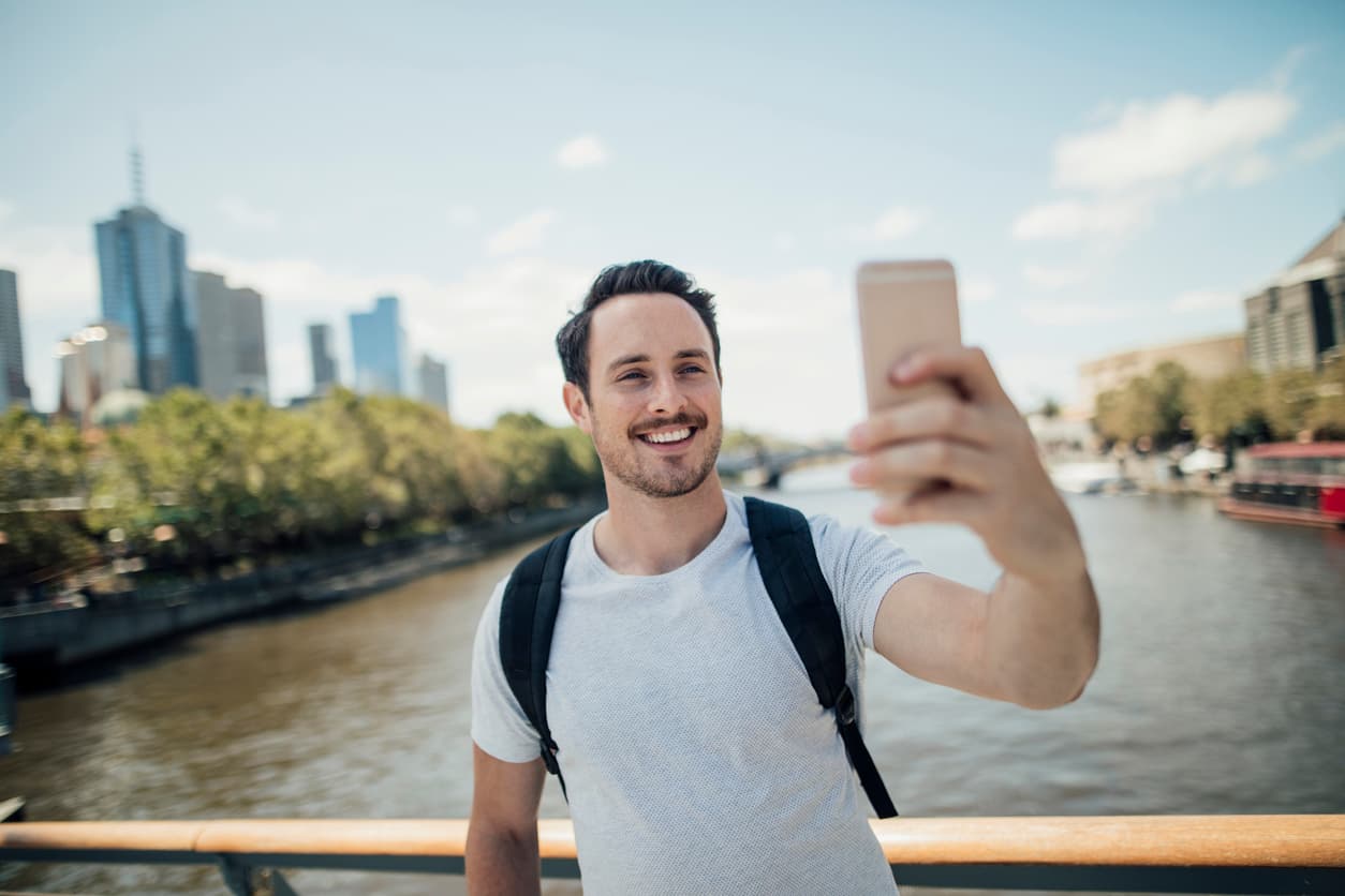 Young man receiving a money transfer in Melbourne, Victoria in Australia