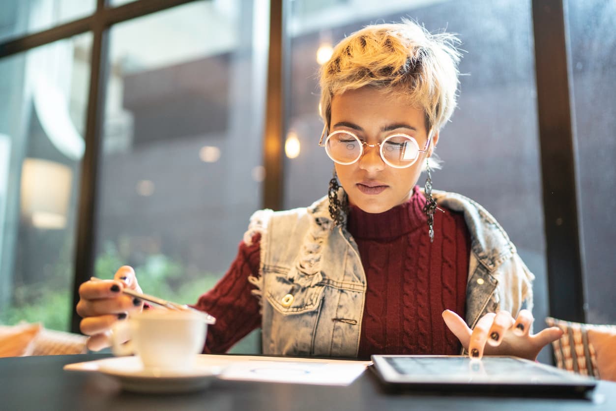 Young woman checking her savings