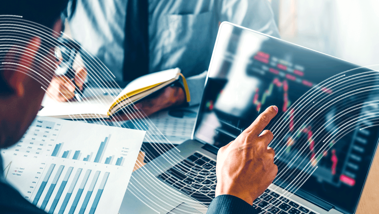 Businessman analyzing charts on financial risk